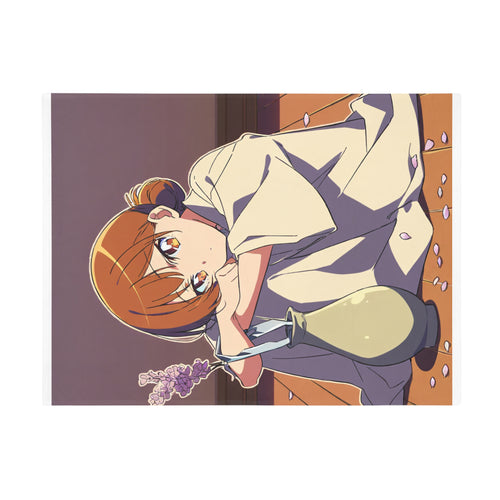 A dried-flower arranger in a beige smock works at a